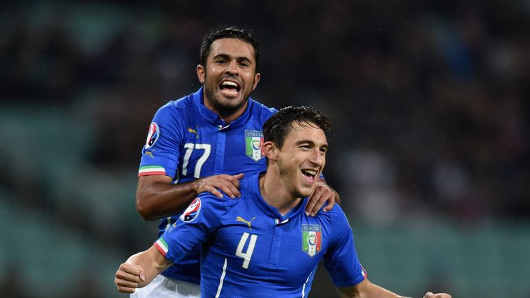 Matteo Darmian celebrates after scoring for Italy as they secured their spot at the European Championships. 