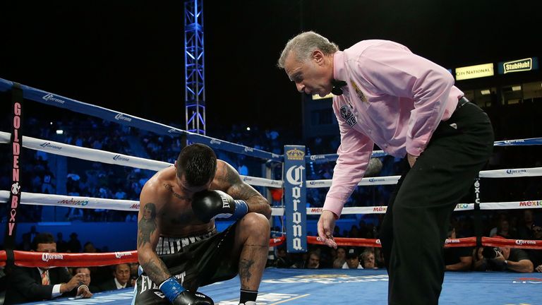 Matthysse is counted out after he was knocked down by Postol