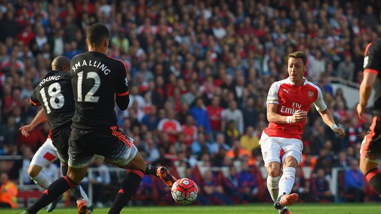 Mesut Ozil puts Arsenal 2-0 up after seven minutes - one minute after Sanchez scored Arsenal's opener