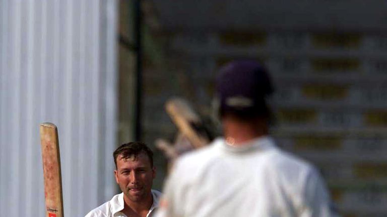 9 Dec 2000: Alec Stewart of England (near) congratulates Michael Atherton of England as he celebrates reaching his century during the third and final test 