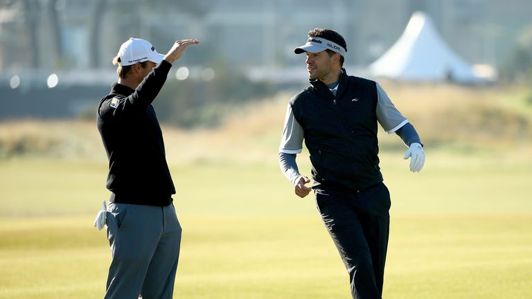 ST ANDREWS, SCOTLAND - OCTOBER 01:  Former German footballer Michael Ballack with his playing partner Florian Fritsch of Germany on the second hole to the 