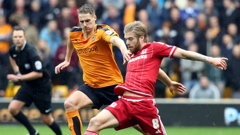 Adam Clayton of Middlesborough shields the ball from Dave Edwards of Wolves