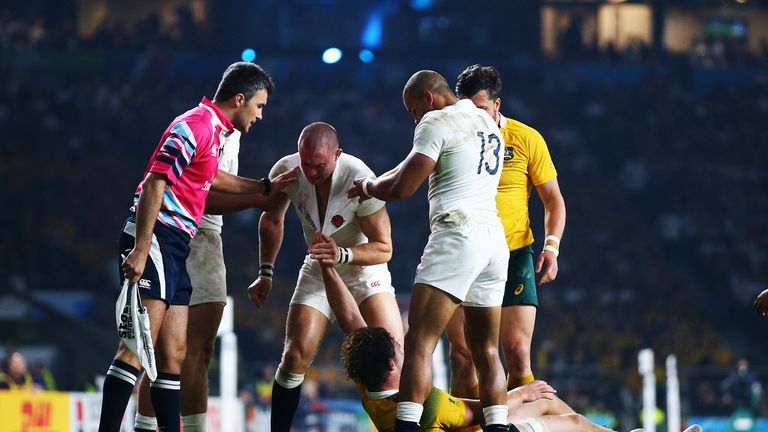 Mike Brown of England and Michael Hooper of Australia come to blows during the 2015 Rugby World Cup Pool A  match