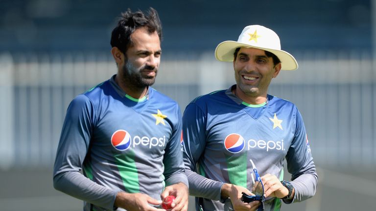 Pakistan captain Misbah-ul-Haq (right) speaks with Wahab Riaz during a nets session at Sharjah Cricket Stadium on October 31, 2015