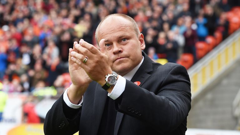 Dundee United boss Mixu Paatelainen applauds the fans 