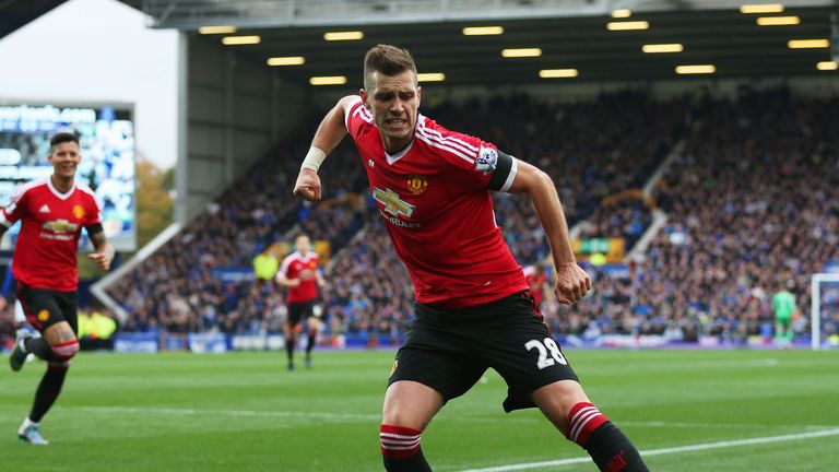 Morgan Schneiderlin of Manchester United celebrates scoring his team's first goal