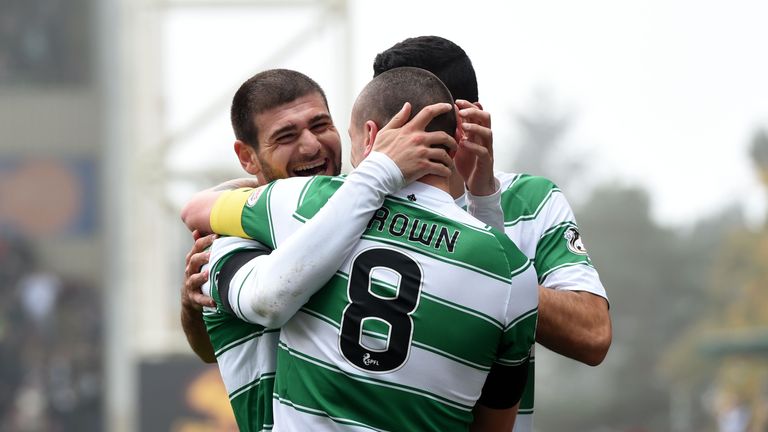 Striker Nadir Ciftci celebrates opening the scoring for Celtic with team-mate Scott Brown