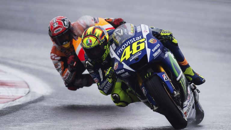 Valentino Rossi of Italy and Movistar Yamaha MotoGP leads Marc Marquez of Spain and Repsol Honda Team