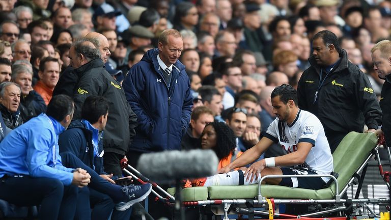 Nacer Chadli is stretchered away for Tottenham's goalless draw against Liverpool
