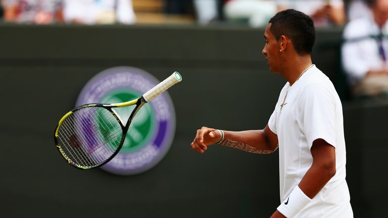 LONDON, ENGLAND - JULY 02:  Nick Kyrgios of Australia throws his racquet in frustration during his Gentlemen's Singles quarter-final match against Milos Ra