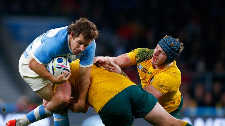 Nicolas Sanchez of Argentina is tackled by James Slipper (c) and David Pocock (r) of Australia during the 2015 Rugby World Cup semi-final