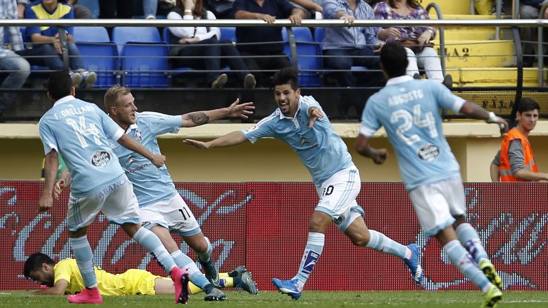 Celta Vigo's forward Nolito (2ndR) celebrates his winning goal with teammates against Villarreal.