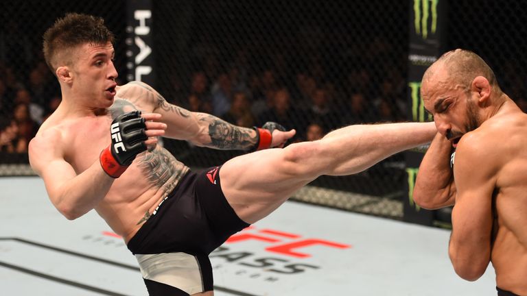 Norman Parke kicks Reza Madadi in their lightweight fight during the UFC event