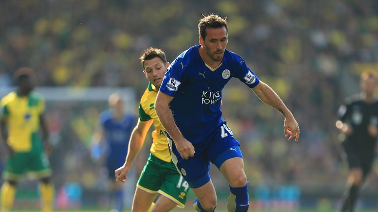 Norwich City's Wes Hoolahan (back) and Leicester City's Christian Fuchs compete for the ball 