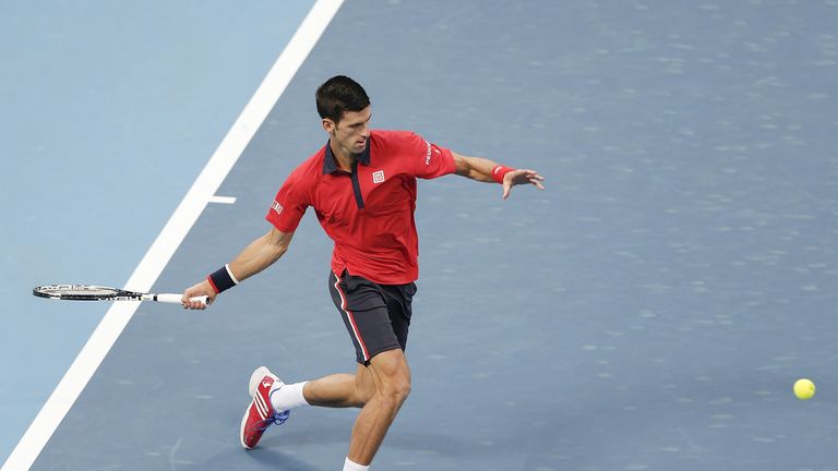 Novak Djokovic of Serbia returns a shot against Zhang Ze of China  during the Men's singles second round match on day six of 