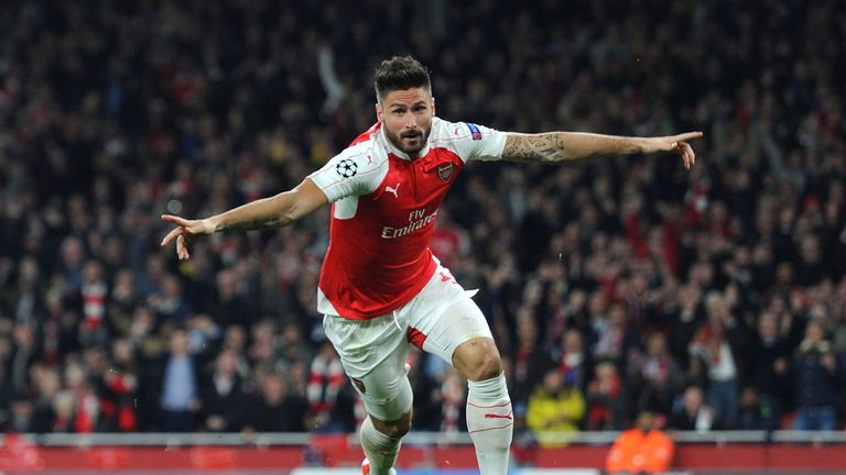 Olivier Giroud celebrates scoring a goal for Arsenal