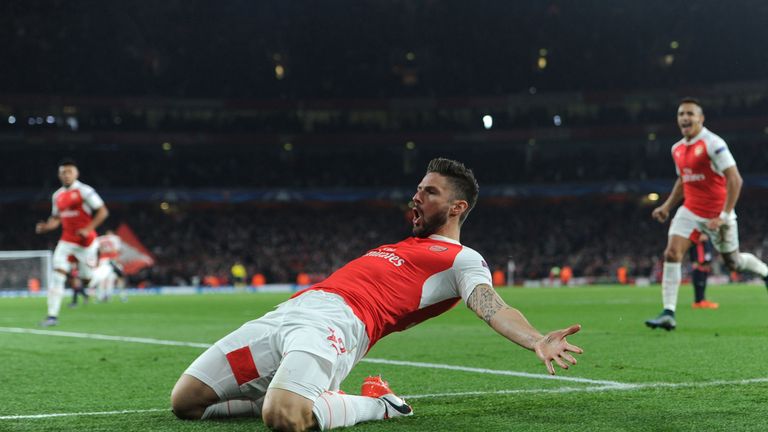 Olivier Giroud celebrates scoring a goal for Arsenal during the UEFA Champions League match between Arsenal and Bayern Munich