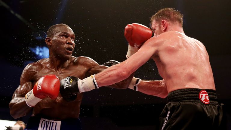 CARDIFF, WALES - AUGUST 17:  Enzo Maccarinelli (R) in action with Ovill McKenzie during their Commonwealth Light-Heavyweight Championship bout at Motorpoin