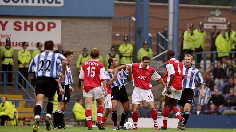 Paolo Di Canio of Sheffield Wednesday tussles with Martin Keown of Arsenal during the FA Carling Premiership match at Hillsborough in 1998