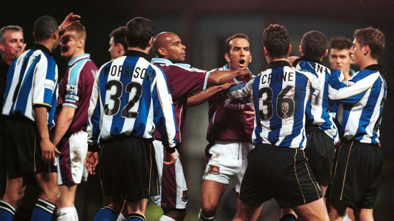 Tempers flare as Paolo Di Canio and Trevor Sinclair of West Ham argue with Sheffield Wednesday players during the Worthington Cup fourth round in 2000
