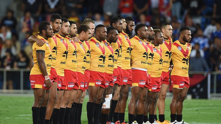 Players of Papua New Guinea stand during the national anthem before the International Test Match
