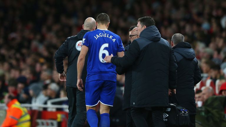 Phil Jagielka of Everton leaves the pitch after picking up injury during the Barclays Premier League match between Arsenal and Everton