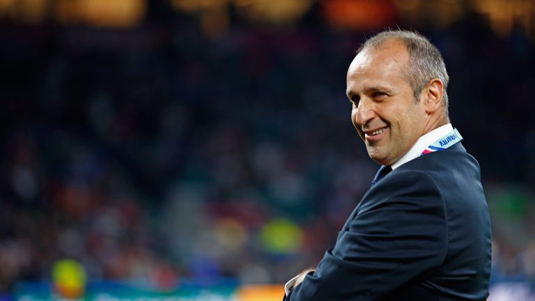 Philippe Saint-Andre offers a smile ahead of France's match against Italy