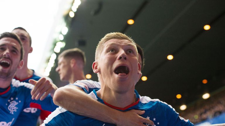 Rangers' Martyn Waghorn celebrates after his injury-time winner against Queen of the South