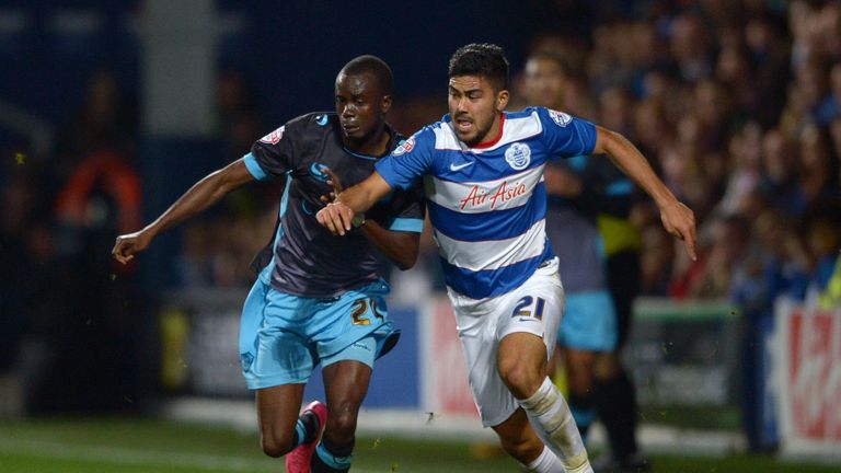 QPR's Massimo Luongo (right) and and Sheffield Wednesday's Modou Sougou battle for the ball during the Sky Bet League Championship match at Loftus Road