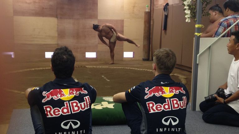 Red Bull drivers Daniel Ricciardo and Daniil Kvyat get a lesson in sumo