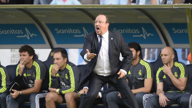 Real Madrid's coach Rafael Benitez shouts from the sideline 