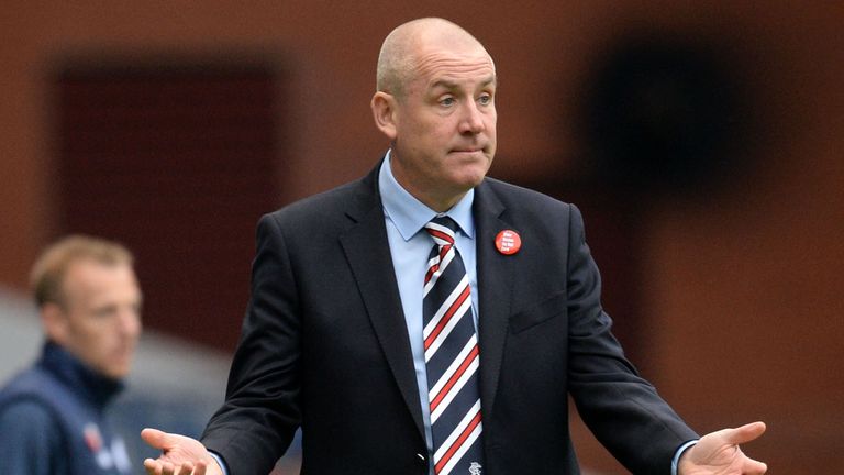 Rangers manager Mark Warburton asks questions on the touchline 