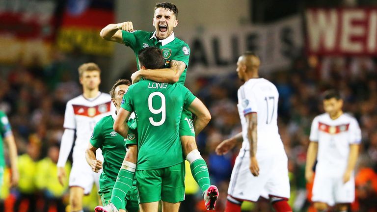 Robbie Brady and Shane Long celebrate Irelan's win over Germany