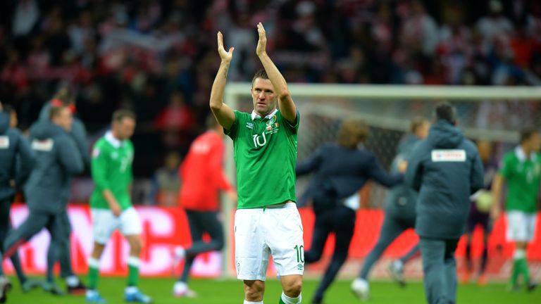 Robbie Keane claps the travelling fans after Republic of Ireland's defeat in Poland