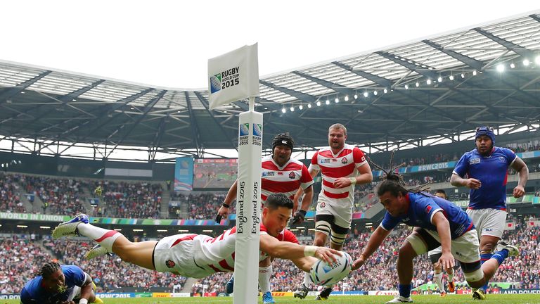 Akihito Yamada of Japan scores Japan's second try against Samoa