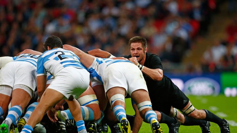 New Zealand's Richie McCaw of the drives the scrum on against Argentina