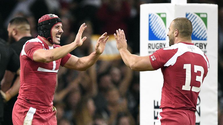 Georgia full-back Beka Tsiklauri (left) celebrates with Davit Kacharava after scoring against New Zealand