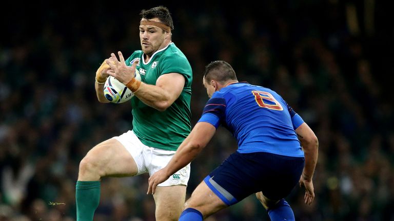 Cian Healy takes on France's Louis Picamoles