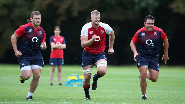 George Kruis (left) and Jamie George sprint during an England training session
