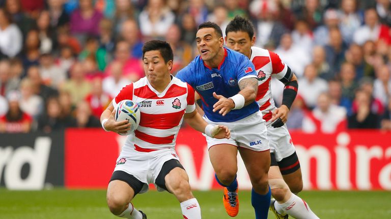 Kosei Ono goes past Samoa scrum-half Kahn Fotuali'i