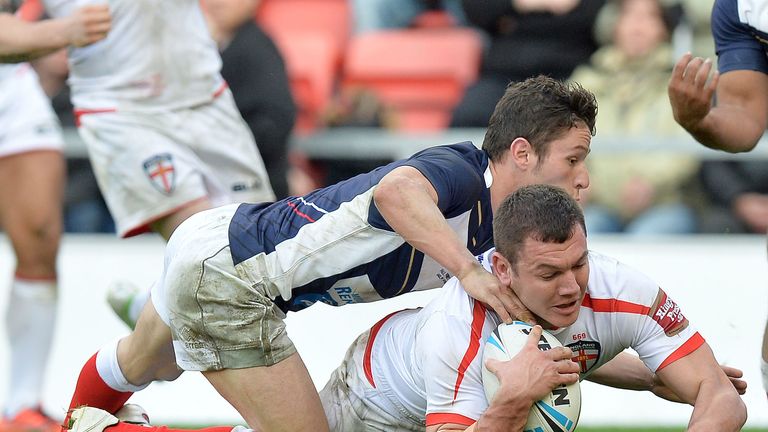 England's Brett Ferres goes over for a try