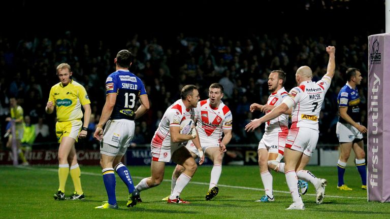 St Helens' James Roby (third left) celebrates scoring his side's first try against Leeds in the Super League semi-final