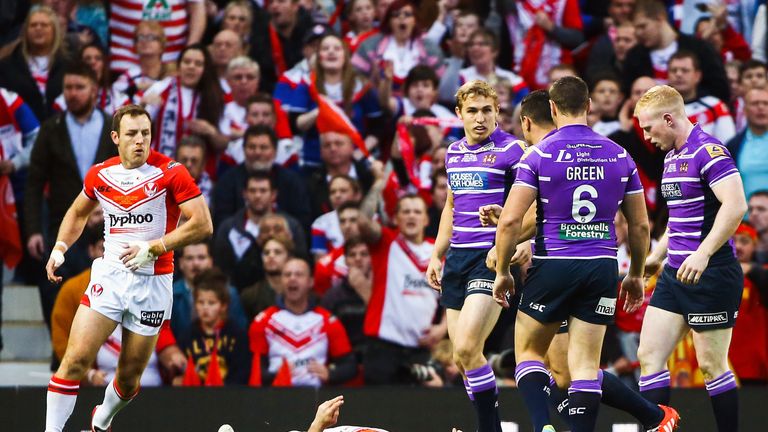 St Helens' Lance Hohaia lies on the ground after being punched by Ben Flower in the 2014 Grand Final