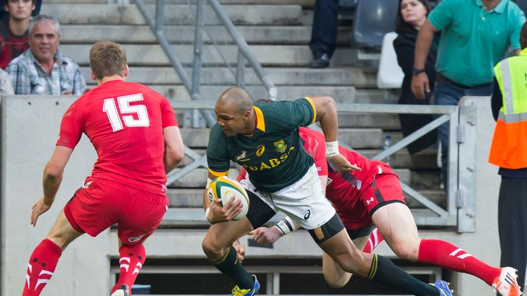 Wales full-back Liam Williams (15) moves towards Cornal Hendricks to concede a penalty try against South Africa in 2014