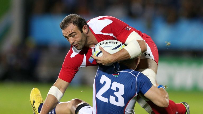 Georgia captain Mamuka Gorgodze is tackled by Namibia's Heinrich Smit