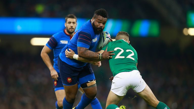 Mathieu Bastareaud of France is tackled by Ian Madigan of Ireland