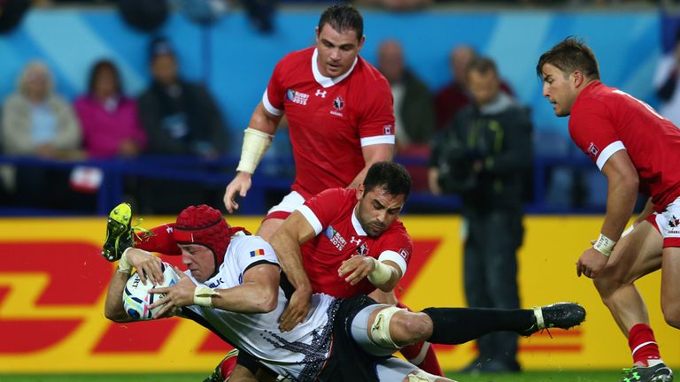 Mihai Macovei scores Romania's second try against Canada