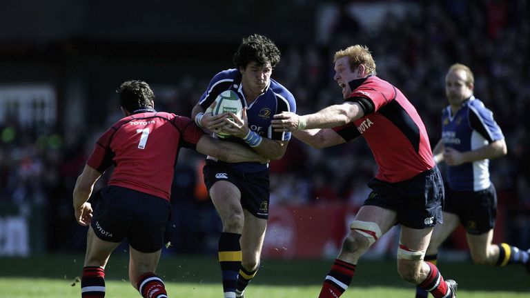 Shane Horgan is tackled by David Wallace and Paul O'Connell during Leinster's Heineken Cup semi-final loss to Munster in 2006