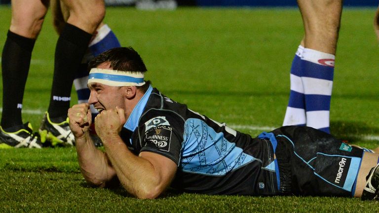 Simone Favaro celebrates his late try for Glasgow against the Dragons