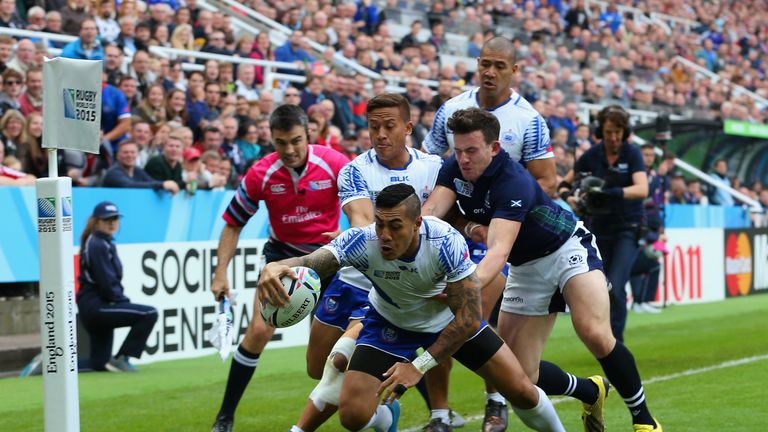 Samoa fly-half Tusi Pisi scores their opening try against Scotland